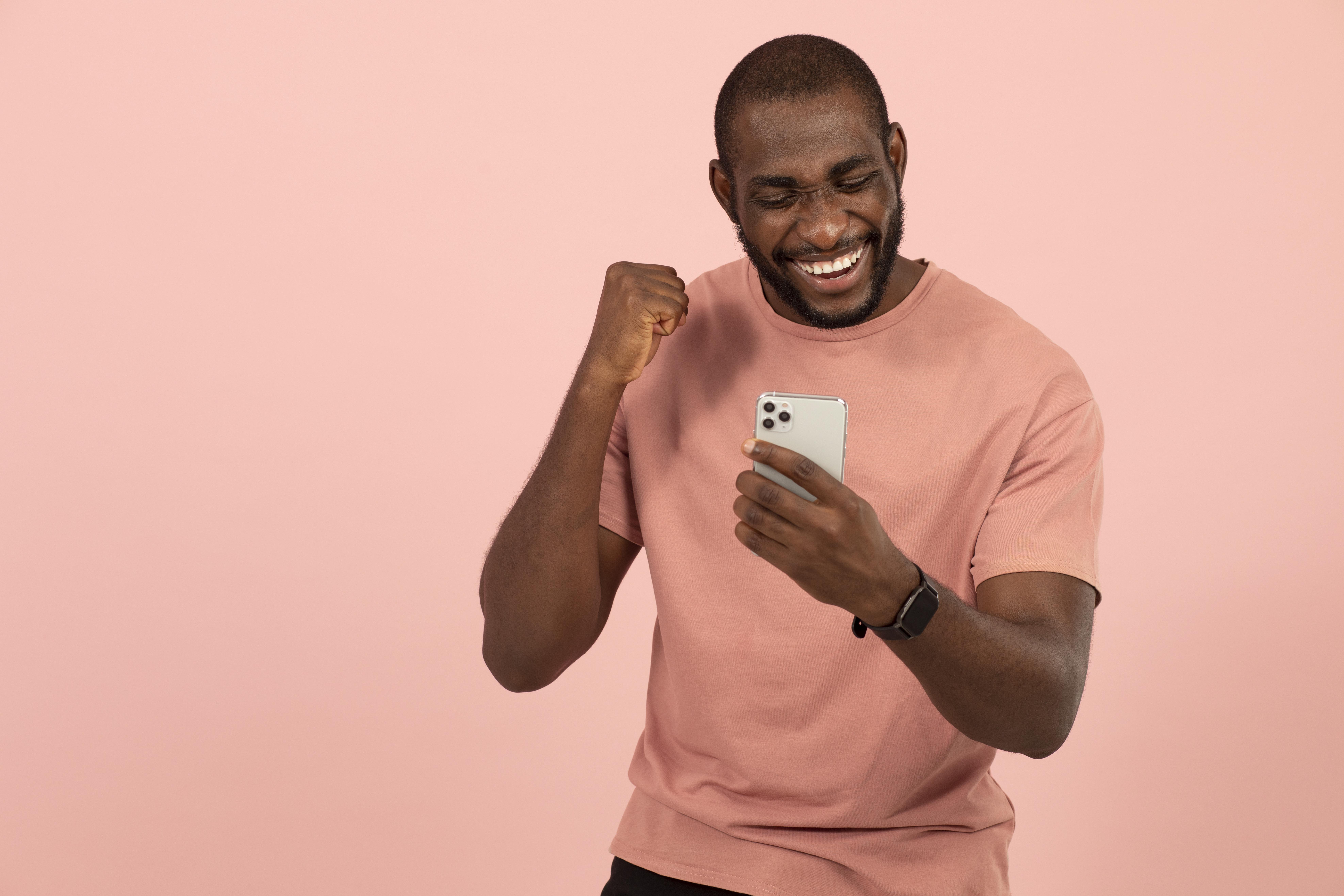 african-american-man-checking-his-smartphone